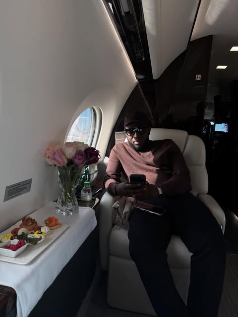 Ahmad Abdulaziz Yari seated inside a private jet